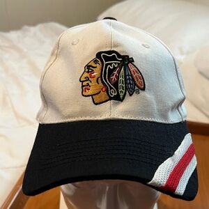 White and Black Baseball Cap with Embroidered Native Head Logo